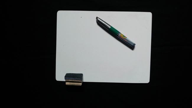 Individual whiteboard, marker, and eraser