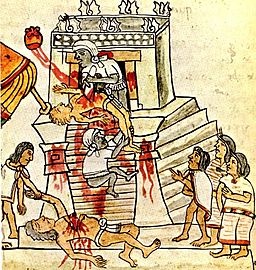 Aztec ritual human sacrifice portrayed in the page 141 (folio 70r) of the Codex Magliabechiano. [Public domain], via Wikimedia Commons