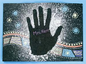 The stenciled hand print and
aboriginal style drawings help children to relate to
the man from the Australian Aboriginal Culture
stated above, while helping them to understand the
use of line in art. A black paper with white
splattered paint was used, but white paper with red
(ochre) splattered paint would make a nice
impression also. Construction paper crayons make
bright, bold, linear designs around the hand stencil.