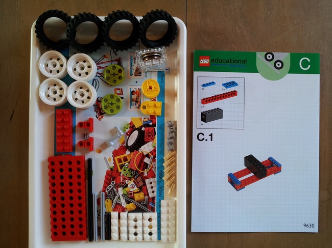 The pieces needed from LEGO WeDo Set # 9585. The coins in the gearbox are just another makeshift weight.