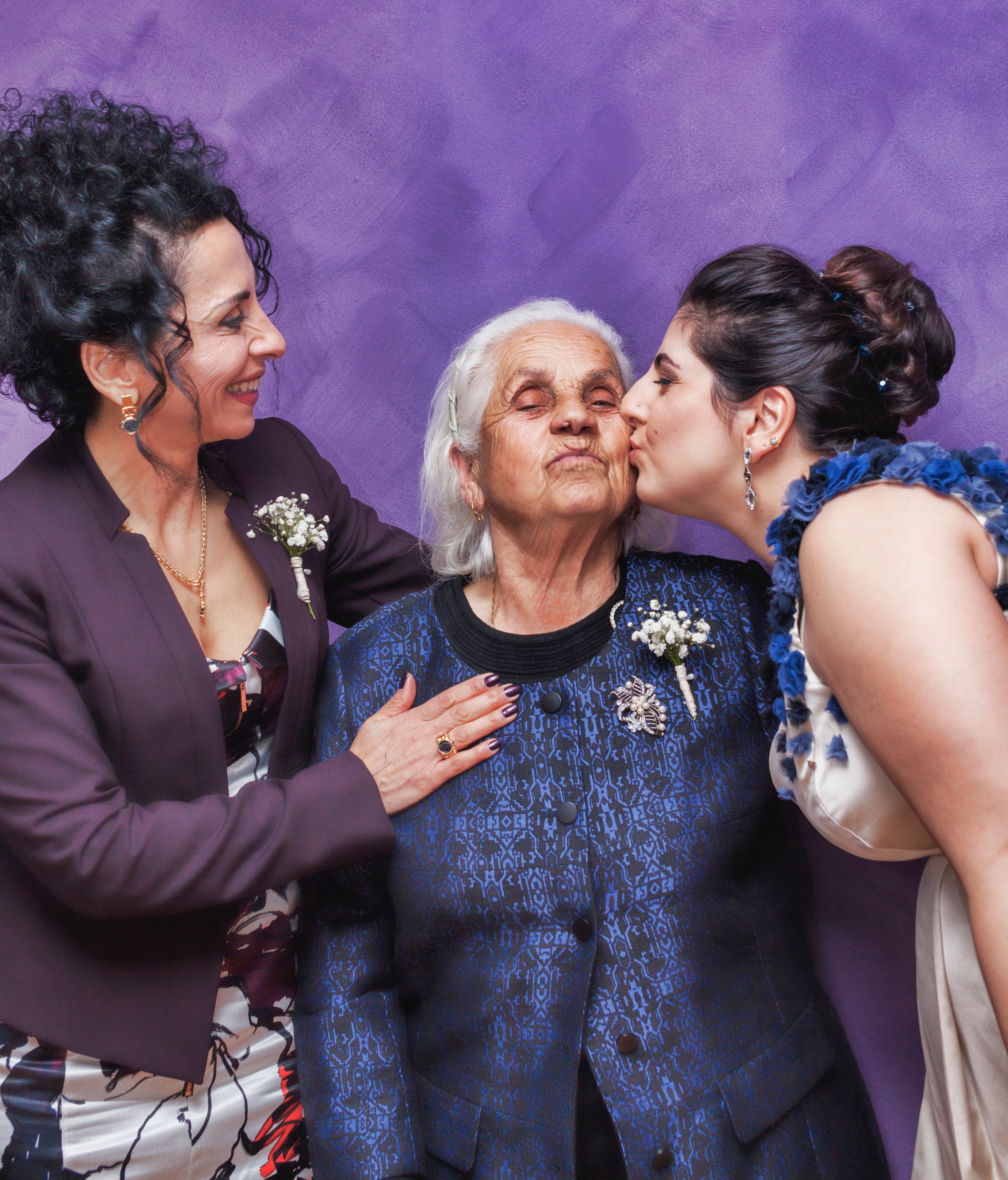 two women appreciating their grandmother