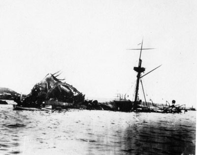 The sunken USS Maine in Havana harbor. Author Unknown [Public domain], via Wikimedia Commons.