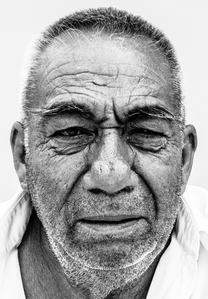 A close-up picture of an older Arab man's face.