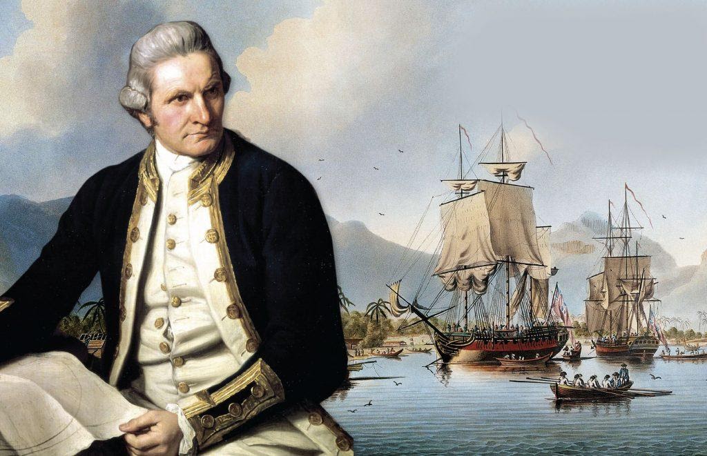 Color portrait of James Cook in uniform. Ships and mountains, presumably New Zealand, behind him.
