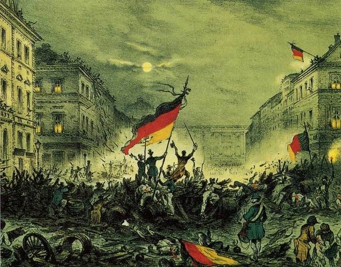 Drawing of a crowd of people hoisting the black, red, yellow horizontal striped flag amid destruction.