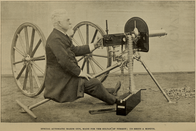 newspaper photo of man with rudimentary freestanding machine gun