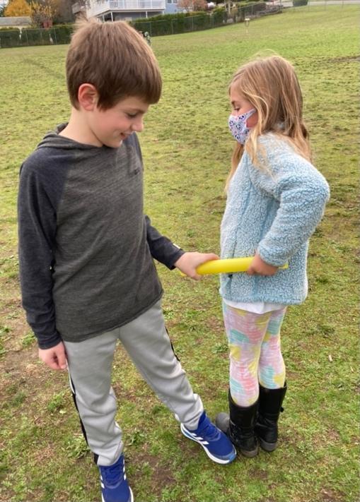 children pulling stick