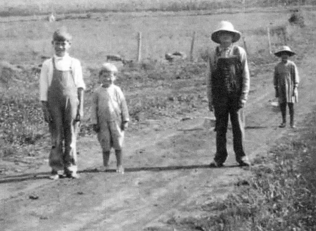 Farm children walking home from school-lunch pails- pinafore-straw hats