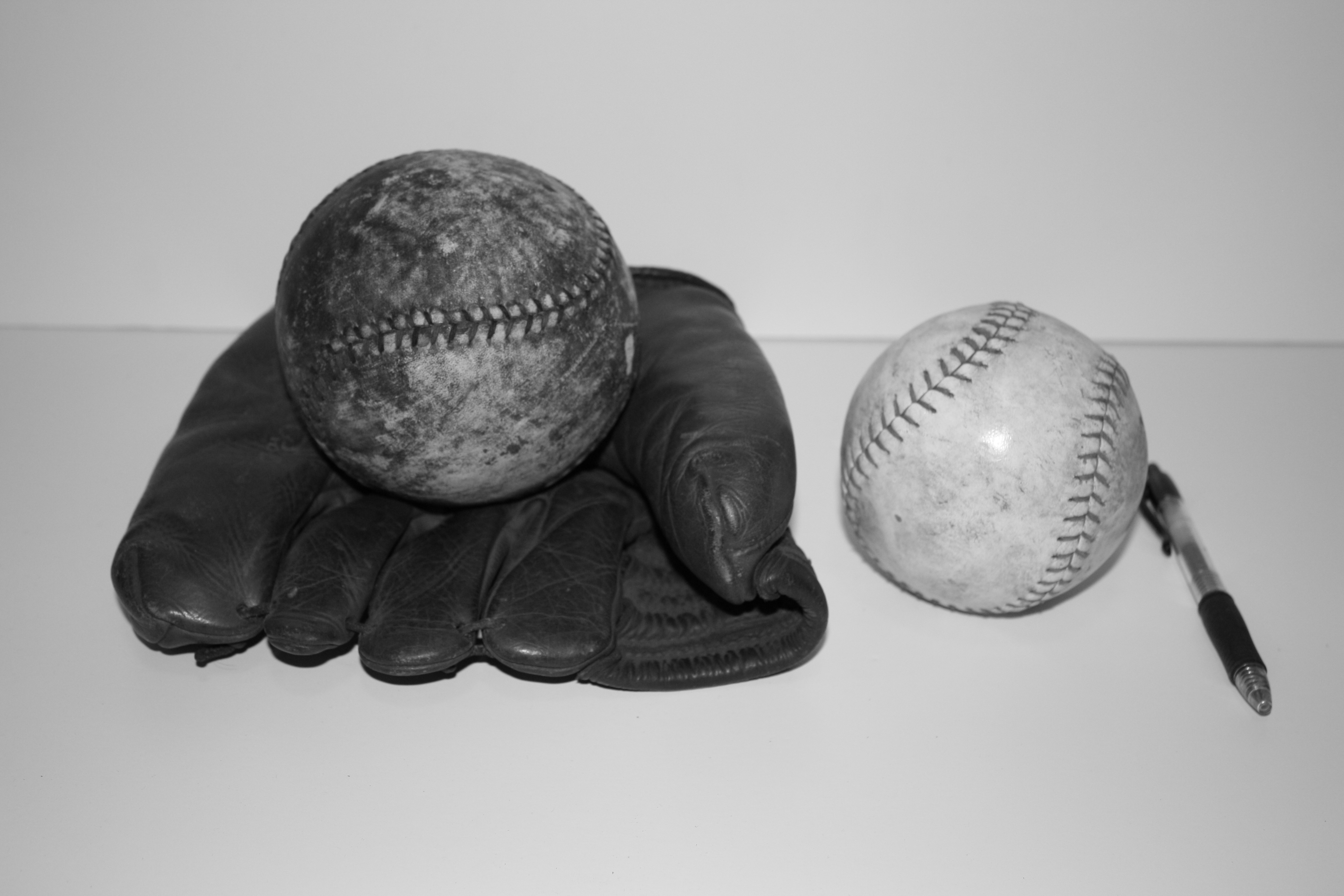 Farm children toys 1800s softball left larger than 1900s softball right