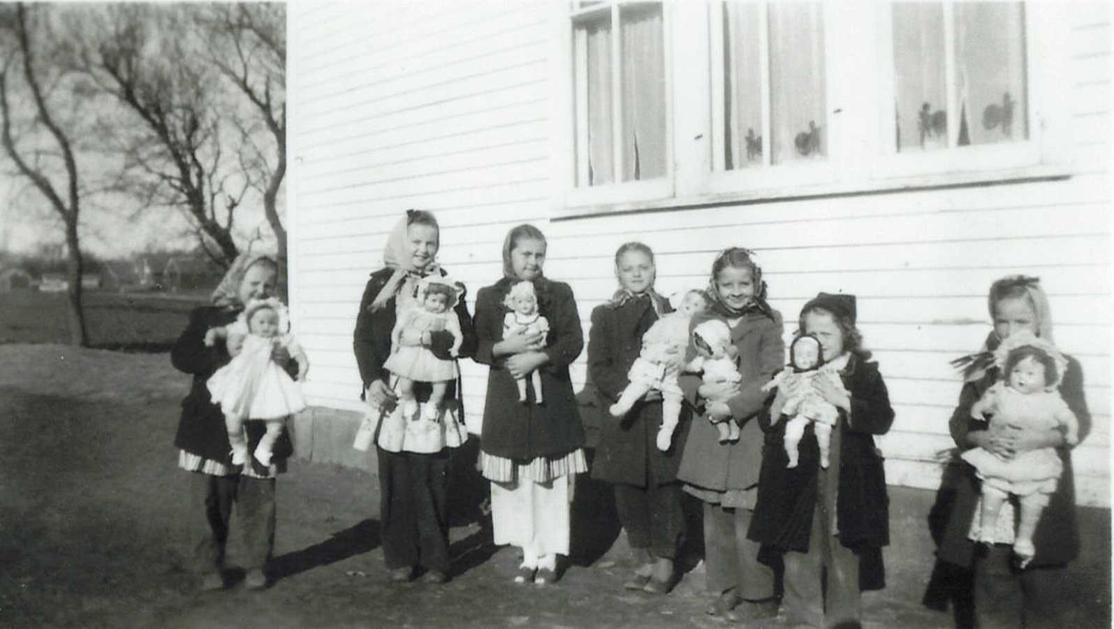 Farm children girls with dolls 1940's