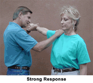 Therapist Performing a Muscle Test