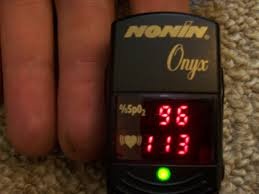 An operating oximeter, demonstrating the heart rate and oxygen saturation.
