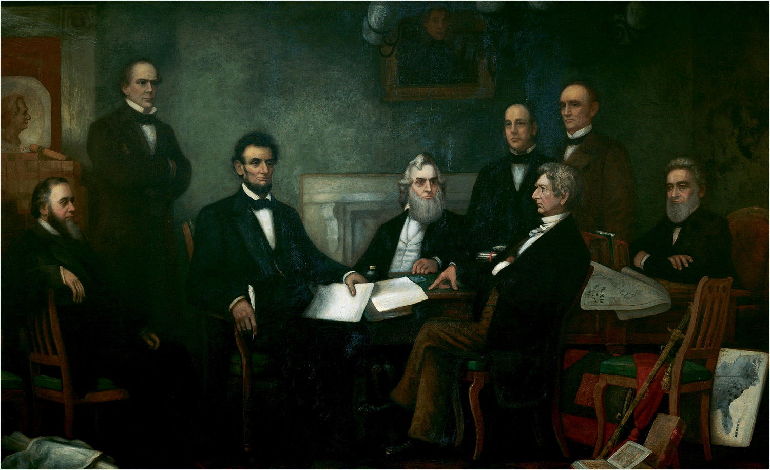 “First reading of the Emancipation Proclamation of President Lincoln,” by Francis Bicknell Carpenter [Public domain], via Wikimedia Commons
Shown from left to right are: Edwin M. Stanton, secretary of war (seated); Salmon P. Chase, secretary of the treasury (standing); Abraham Lincoln; Gideon Welles, secretary of the navy (seated); Caleb Blood Smith, secretary of the interior (standing); William H. Seward, secretary of state (seated); Montgomery Blair, postmaster general (standing); Edward Bates, attorney general (seated).
